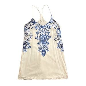 Blue floral patterned top with spaghetti straps, fully lined